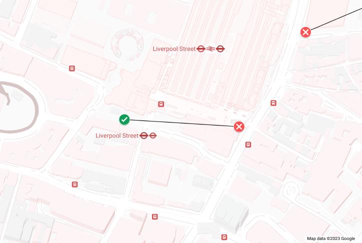 A map showing two map markers either side of Liverpool Street Station, one a green tick and one a green cross. They are connected by a line.